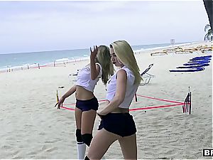 three teenage lovelies catch a ginormous impaler on the beach