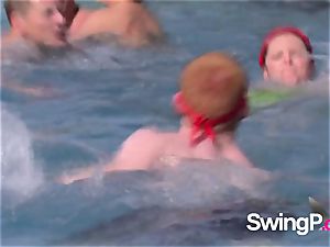 horny redheads play with different stripped to the waist gals by the pool